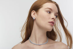 Diamond necklace worn by woman.