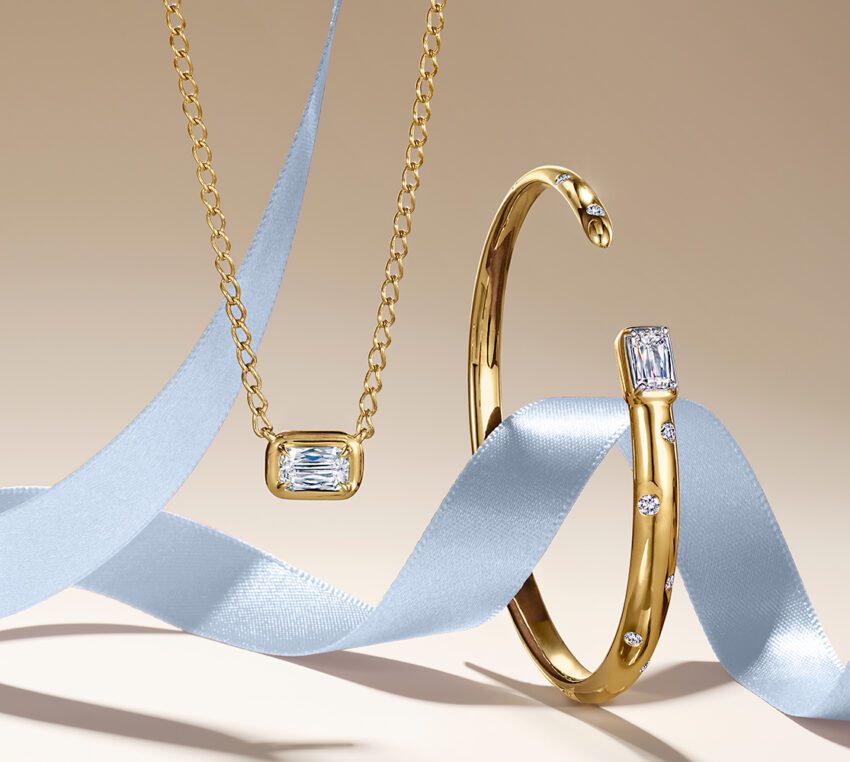 Kwiat diamond earring and necklace set, in gold.