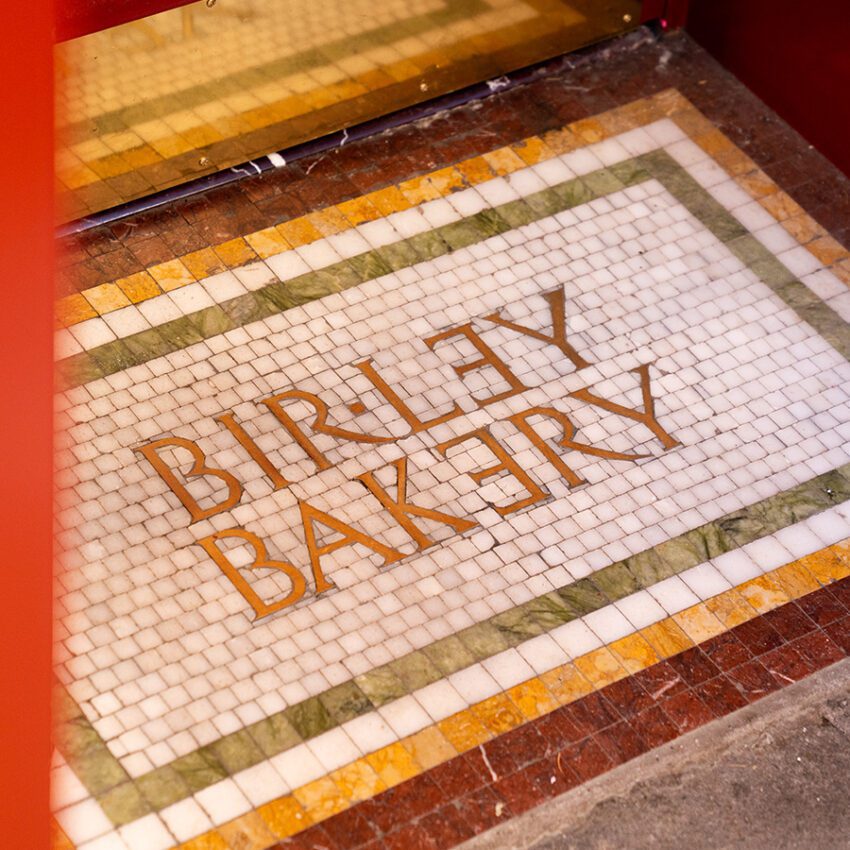 Birley Bakery spelled on tile floor mat
