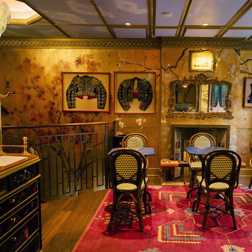 Birley bakery upstairs room with two bistro tables and fireplace