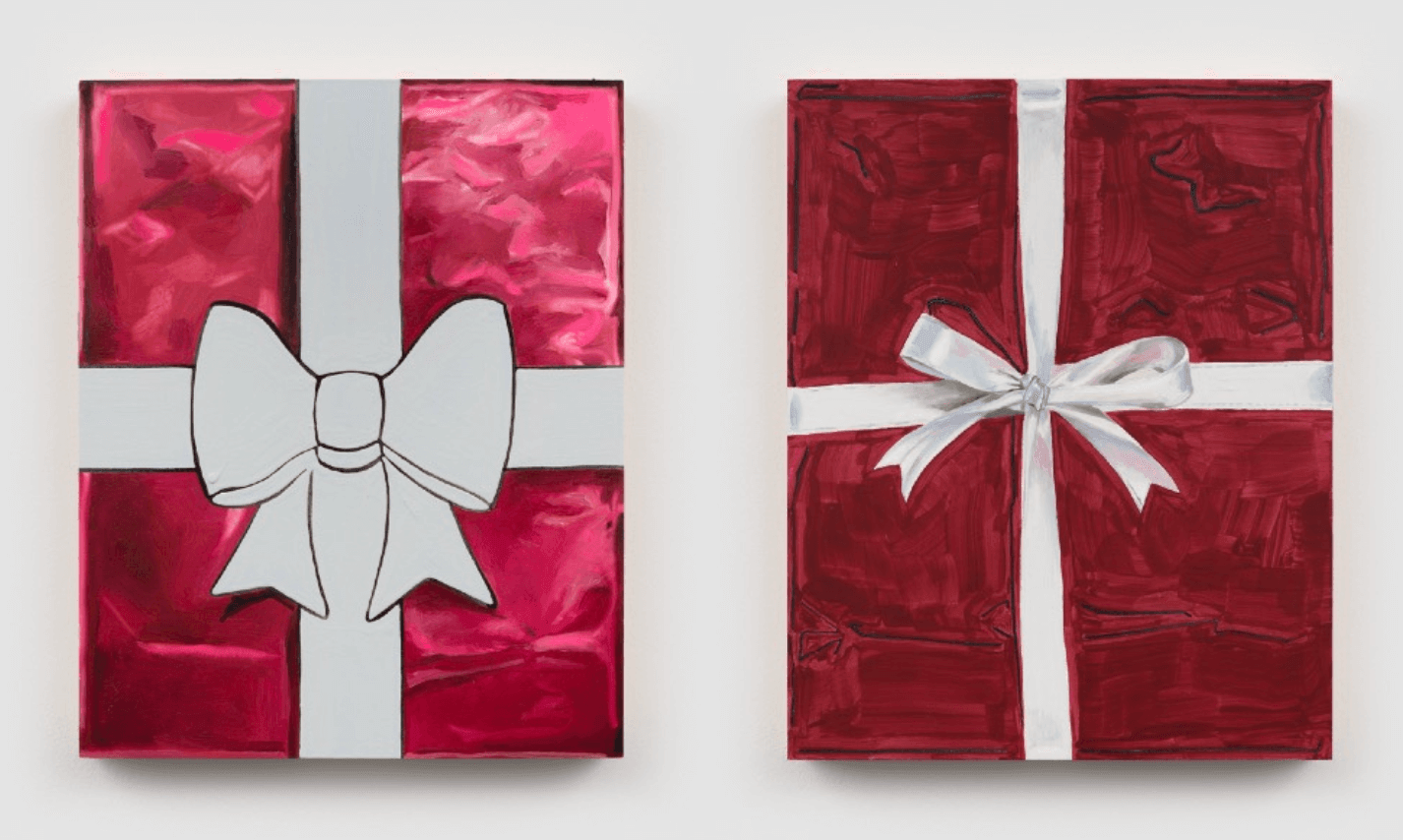 Two red gift boxes with bows.