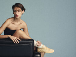 Model wearing Jimmy Choo sneakers