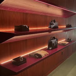 back lid wood panel display wall with Ruti clothing & accesories