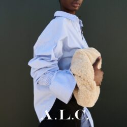 Model wearing A.L.C shirt, jeans and handbag