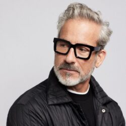 Male model wearing SEE eyeglasses
