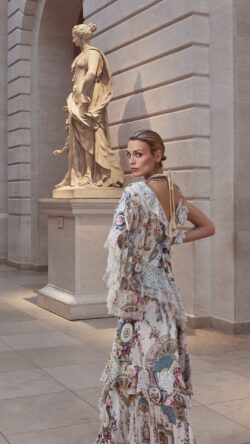 model wearing The Met x Camilla dress