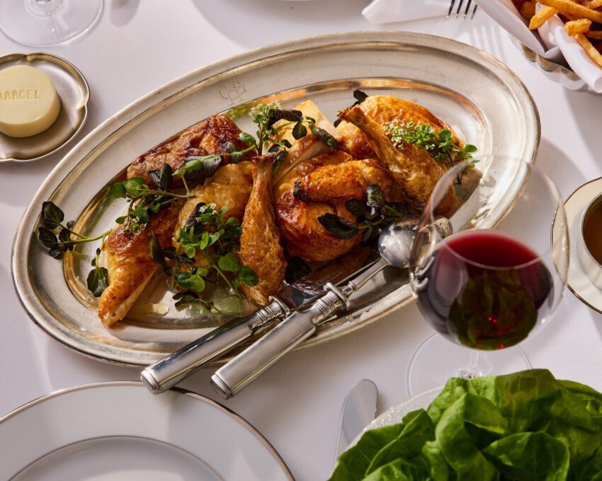 roast chicken and wine on table