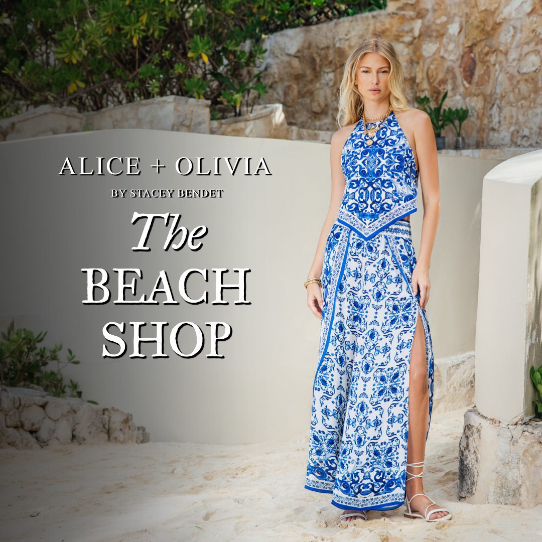 Model wearing blue and white Alice + Olivia dress