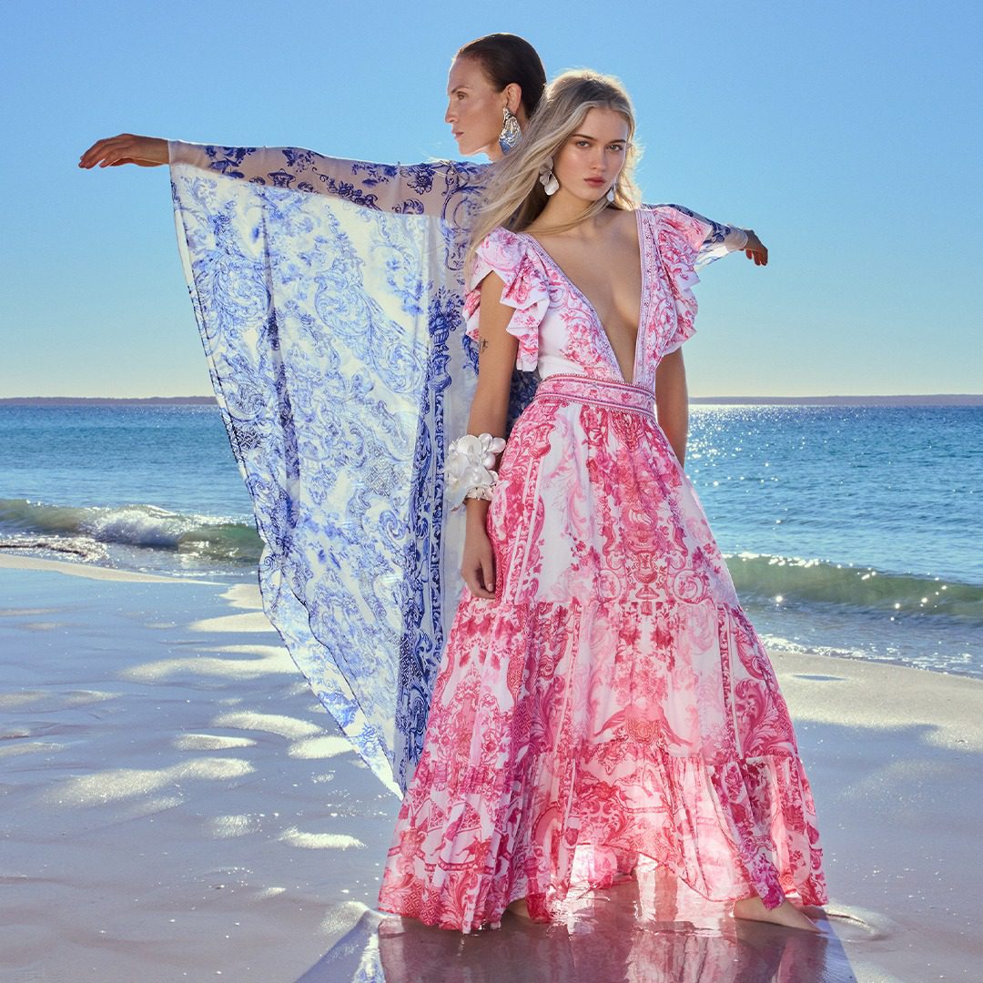 MODELES ON THE BEACH WEARING LONG CAMILLA DRESSES