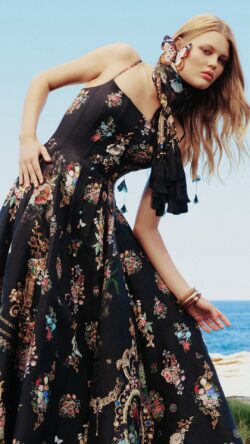model wearing long black print Camilla dress