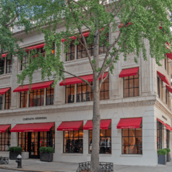 Carolina Herrera storefront with red awnings