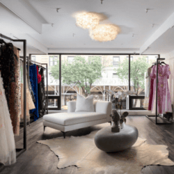 Flora on Madison store with racks of clothes and white coach