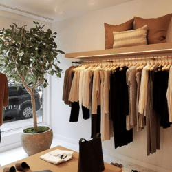 Jenni Kayne clothing on rack inside store