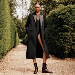 ME+EM model wearing a black coat.