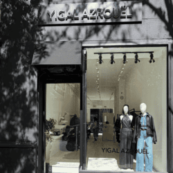 Yigal Azrouel store front madison avenue mannequins wearing denim and black outfits