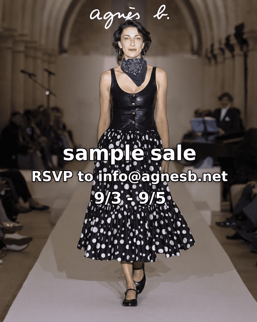 model on catwalk wearing agnes b. black and white dress
