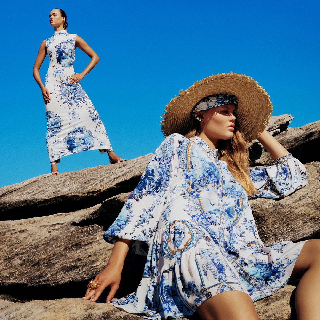 Models on rocks wearing Camilla print dresses