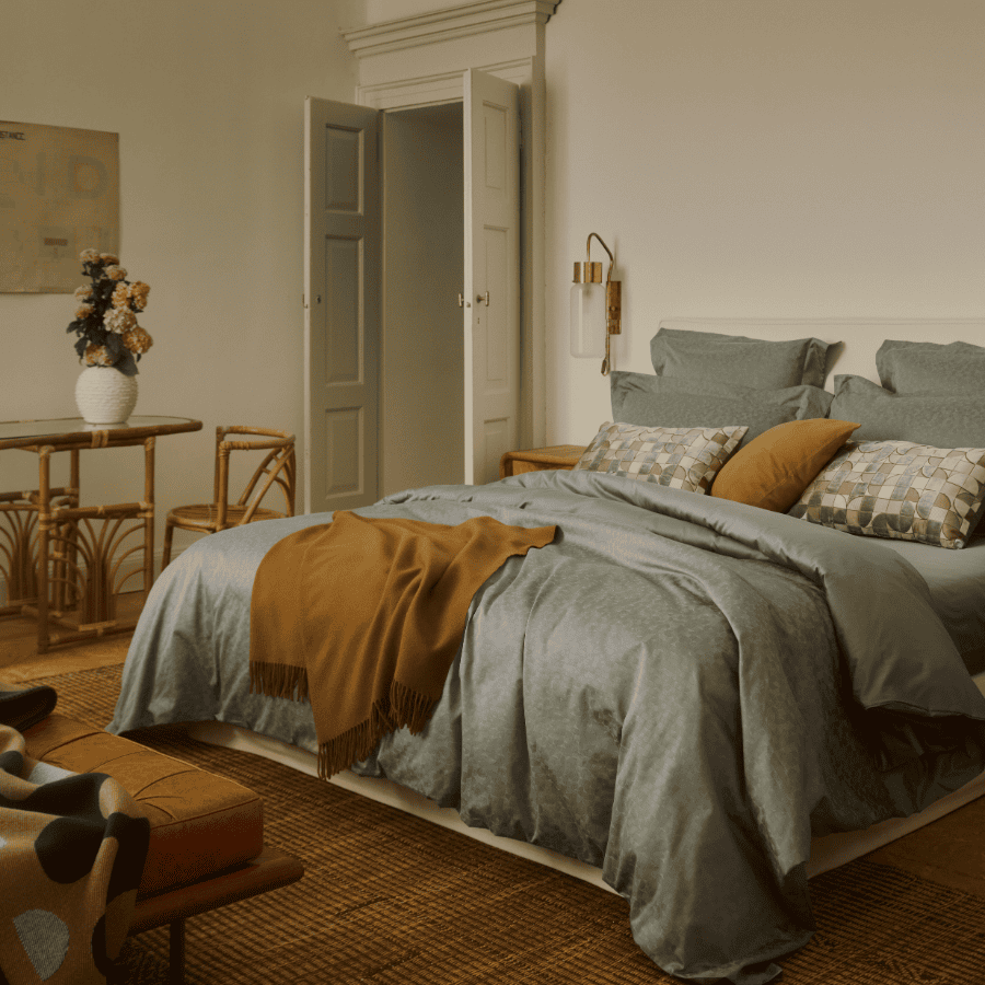 bed with grey Frette bedding