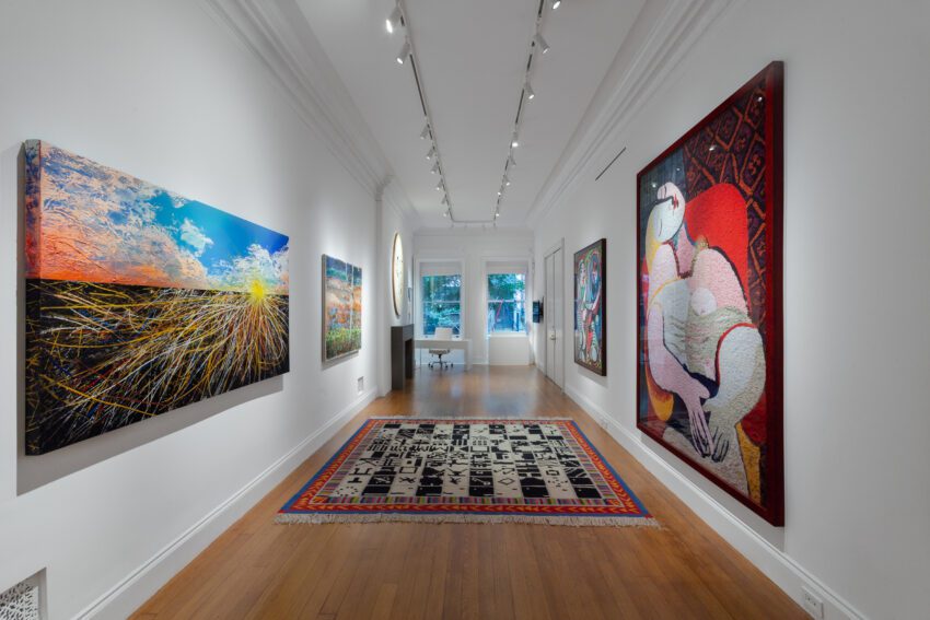 Ben Brown Fine Arts Gallery hall with art and rug