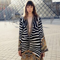 model weaing Camilla zebra striped dress