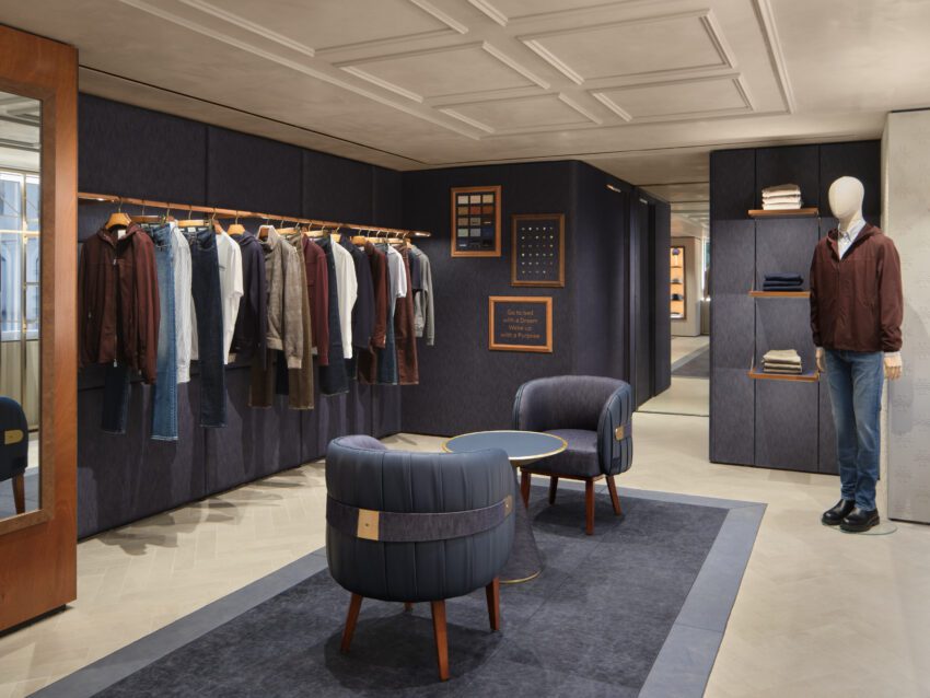 inside Jacob Cohen madison avenue store clothing hanging on racks